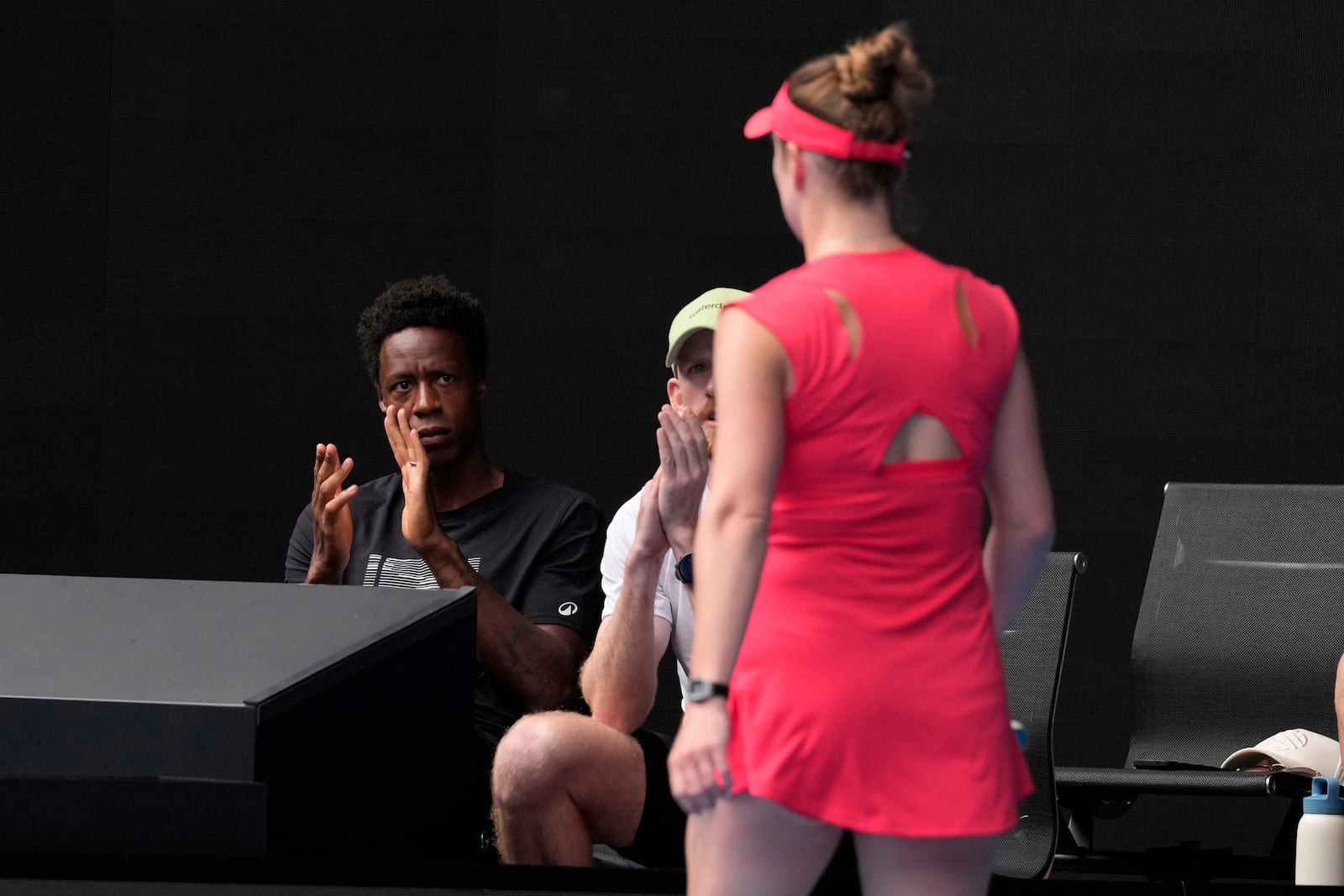 Gael Monfils reacts as he watches his wife, Elina Svitolina of Ukraine during her quarterfinal against Madison Keys of the U.S. at the Australian Open tennis championship in Melbourne, Australia, Wednesday, Jan. 22, 2025. (AP Photo/Manish Swarup)