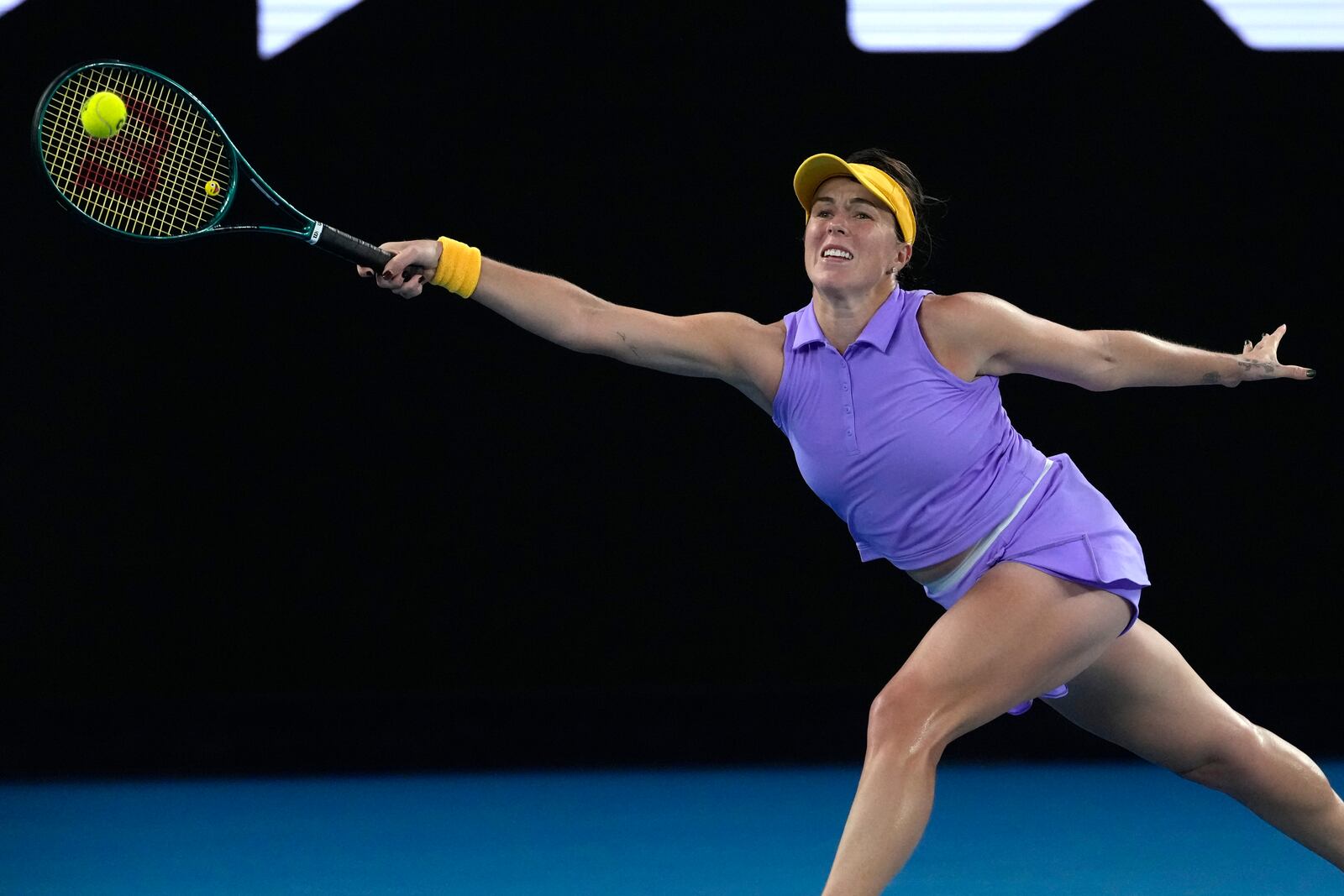 Anastasia Pavlyuchenkova of Russia plays a forehand return to Aryna Sabalenka of Belarus during their quarterfinal match at the Australian Open tennis championship in Melbourne, Australia, Tuesday, Jan. 21, 2025. (AP Photo/Manish Swarup)