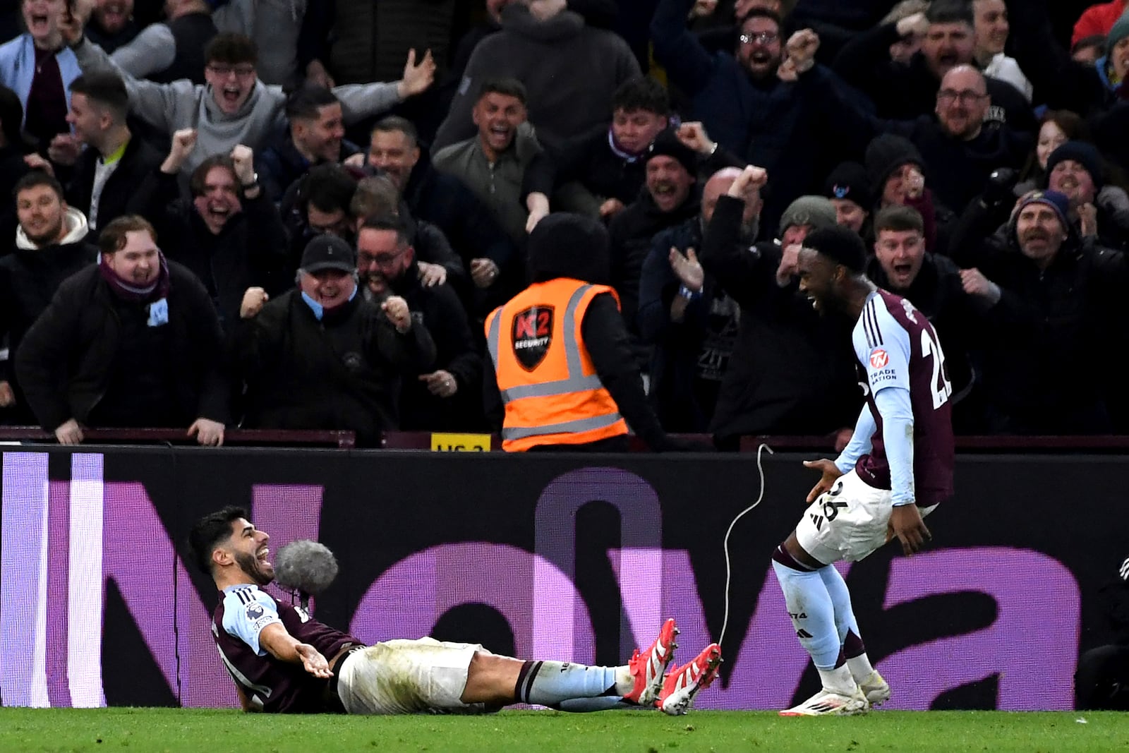 Aston Villa's Marco Asensio, left, celebrates after scoring his second goal against Chelsea during the English Premier League soccer match between Aston Villa and Chelsea at Villa Park in Birmingham, England, Saturday, Feb. 22, 2025. (AP Photo/Rui Viera)