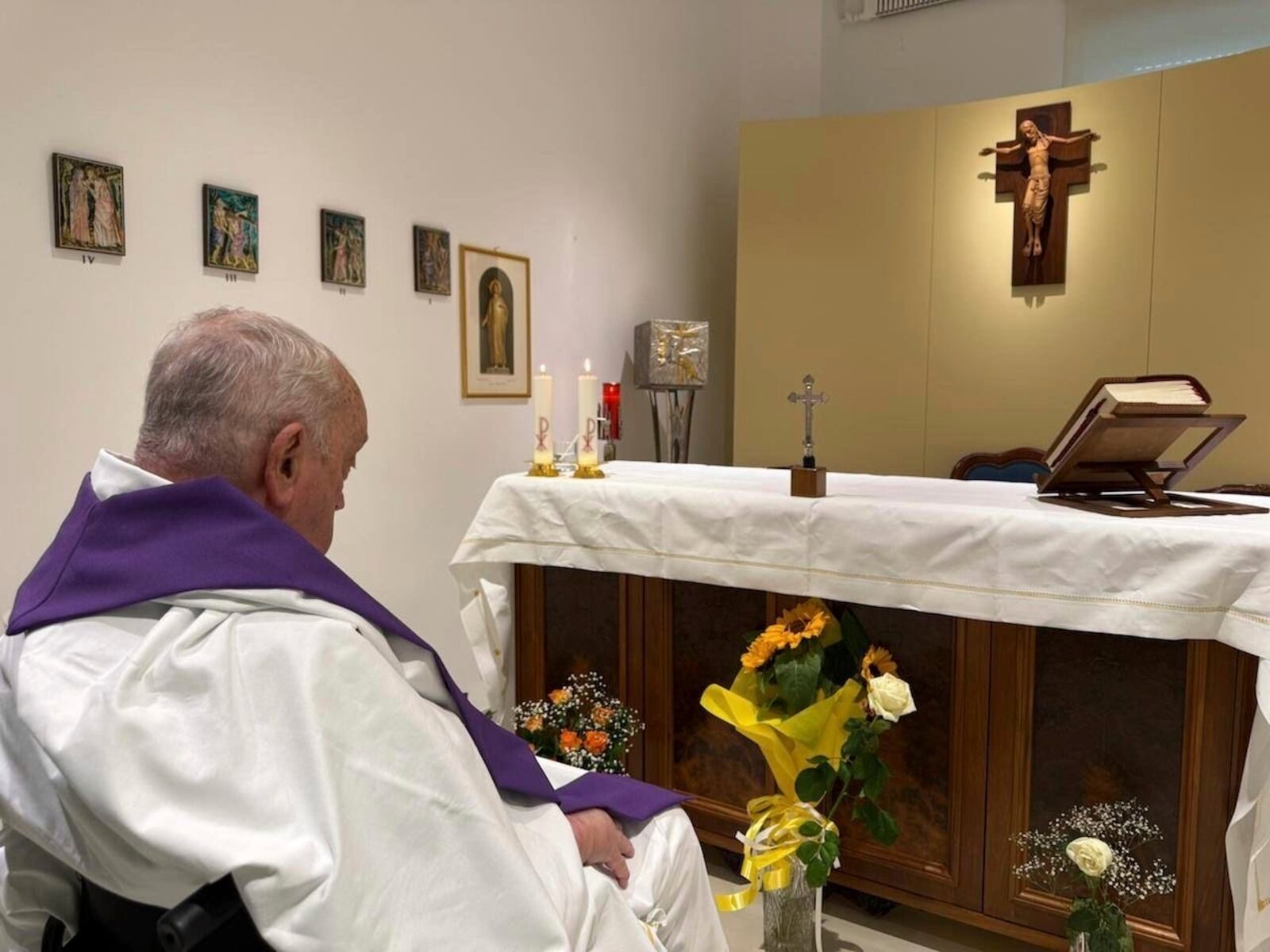 FILE-- This picture released by the Vatican Press Office shows Pope Francis concelebrating a mass inside his private chapel at the Agostino Gemelli Polyclinic in Rome on Sunday, March 16, 2025. (Vatican Press Office, Via AP, File )