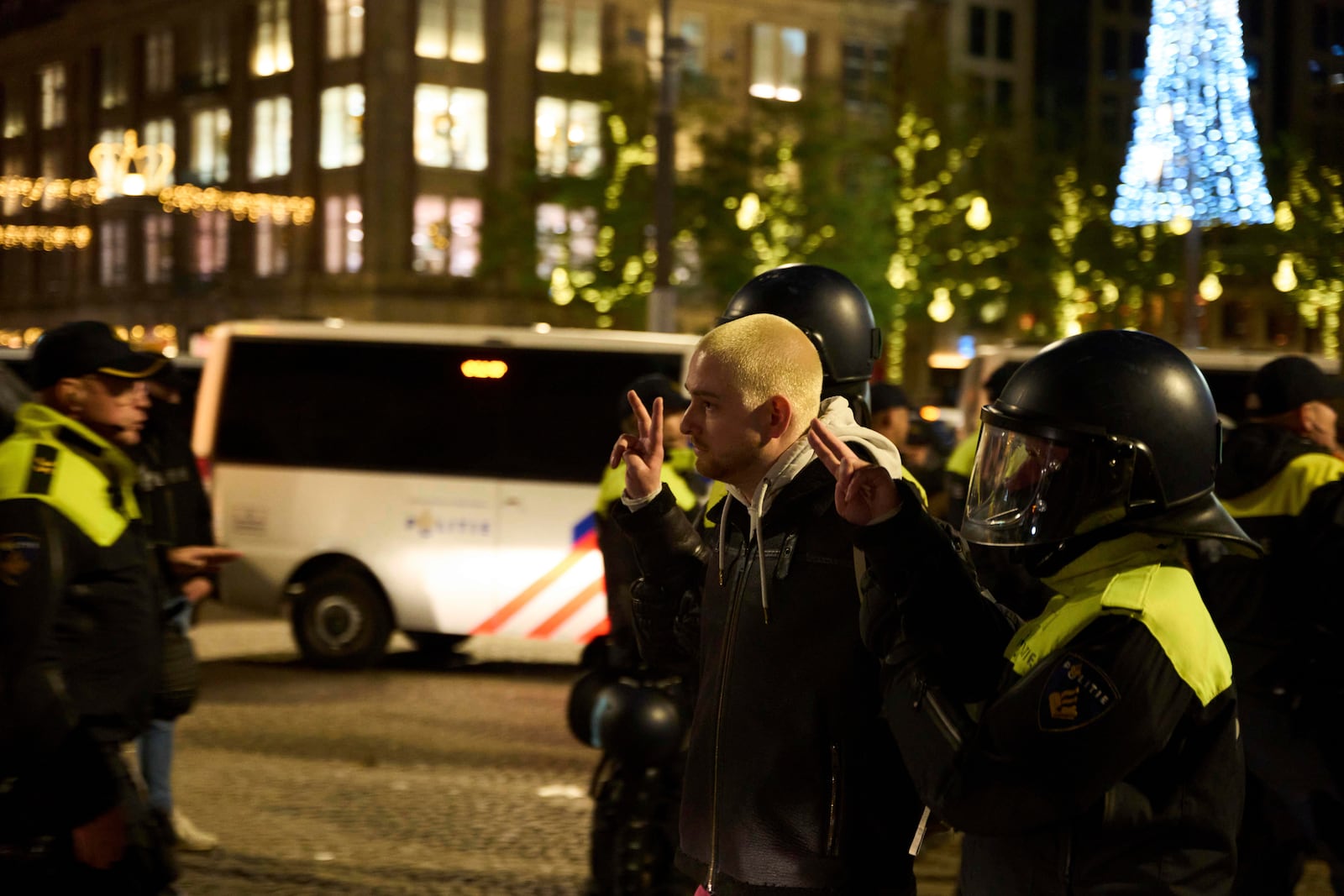 A pro-Palestinian protestor is arrested by police at a demonstration in Amsterdam, Netherlands, Wednesday, Nov. 13, 2024. (AP Photo/Bram Janssen)