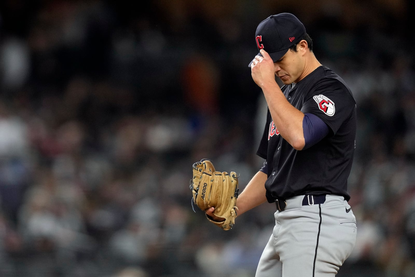 Cleveland Guardians relief pitcher Joey Cantillo adjusts his cap after walking New York Yankees' Gleyber Torres during the fourth inning in Game 1 of the baseball AL Championship Series Monday, Oct. 14, 2024, in New York. (AP Photo/Godofredo Vásquez)