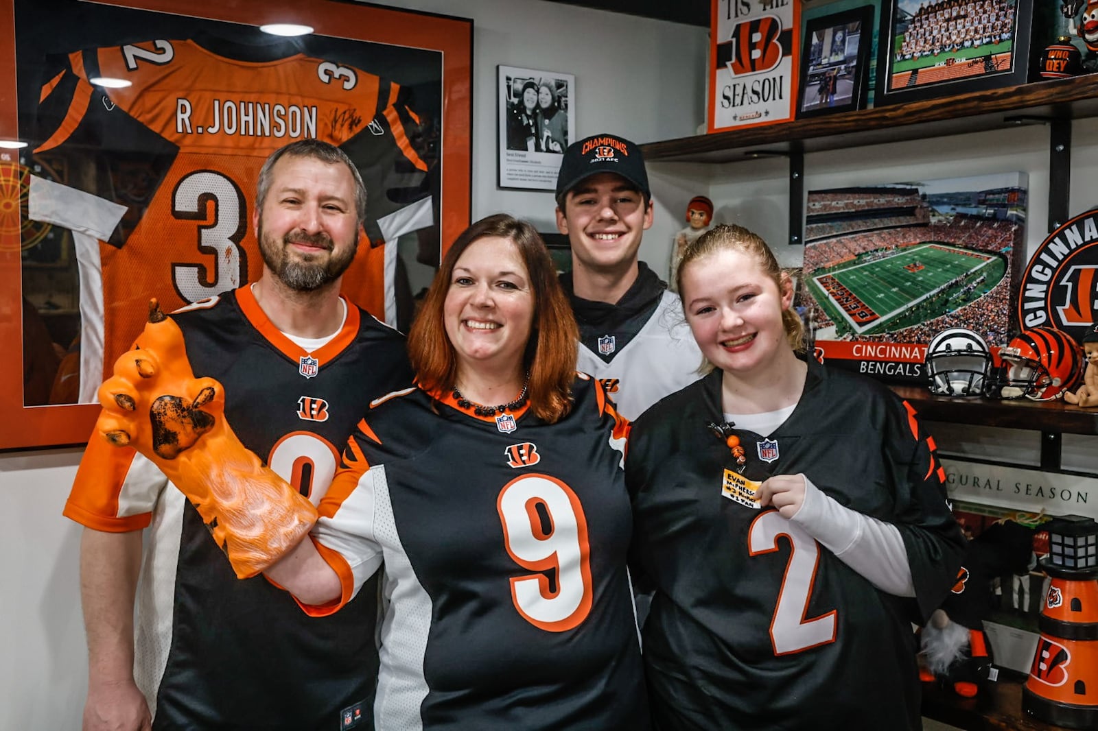 The Wourms family from left, John, Elizabeth, Ben and Natalie are confident the Cincinnati Bengals will not only make it to the Super Bowl again but win it all this time. The Wourms are from Riverside. JIM NOELKER/STAFF