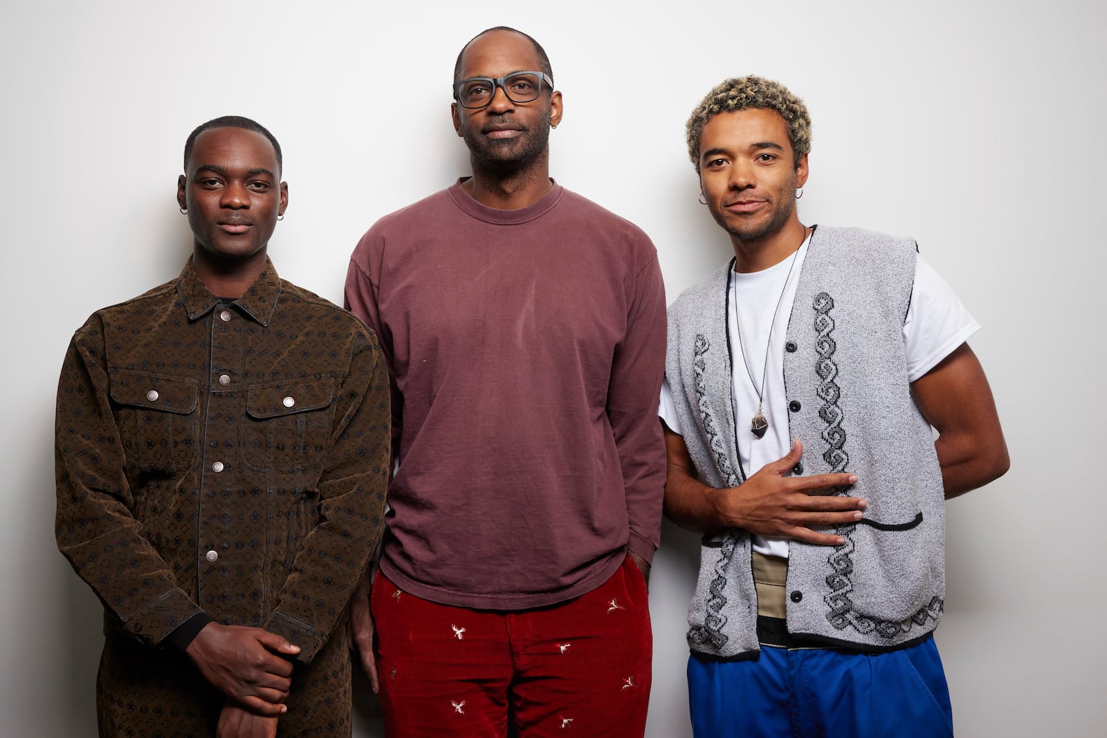 Ethan Herisse, left, RaMell Ross, and Brandon Wilson pose for a portrait to promote the film "Nickel Boys" on Sunday, Sept. 29, 2024, in New York. (Photo by Matt Licari/Invision/AP)