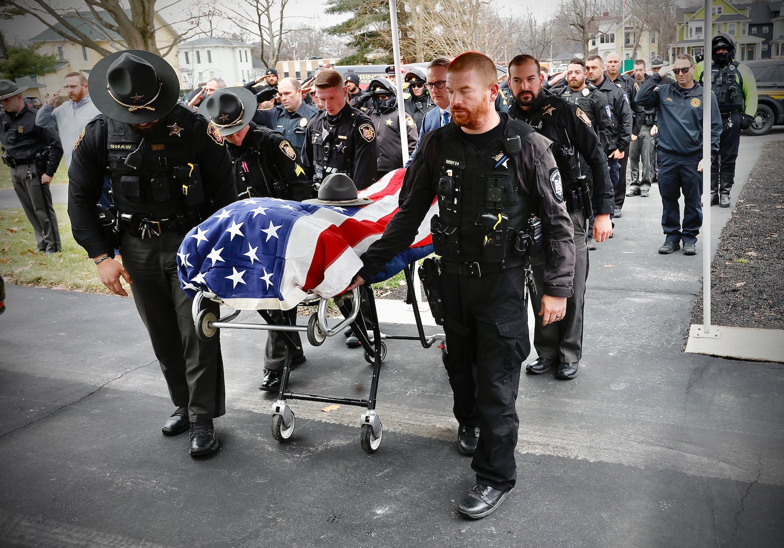 Members of the Clark County Sheriff department carry the body of Summer E. Jenkins  Thursday, Dec. 19, 2024 into the Littleton and Rue Funeral Home in Springfield. MARSHALL GORBY\STAFF