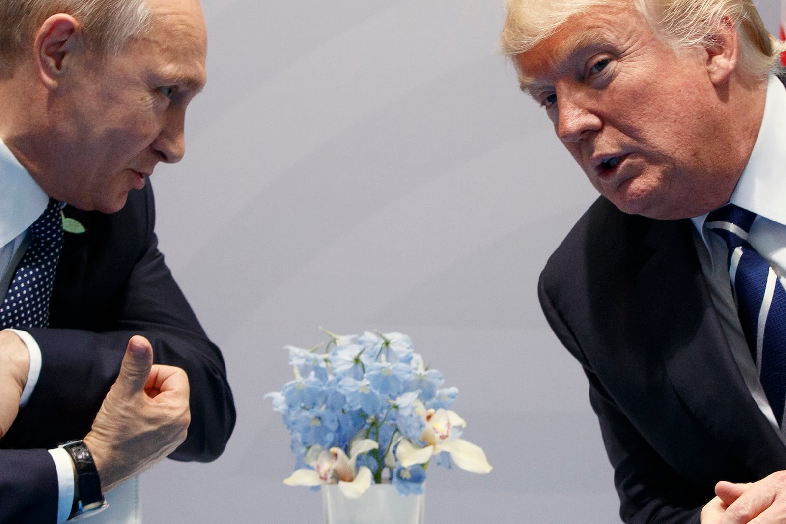 FILE – U.S. President Donald Trump, right, meets with Russian President Vladimir Putin at the G20 Summit in Hamburg, Germany, July 7, 2017. (AP Photo/Evan Vucci, File)