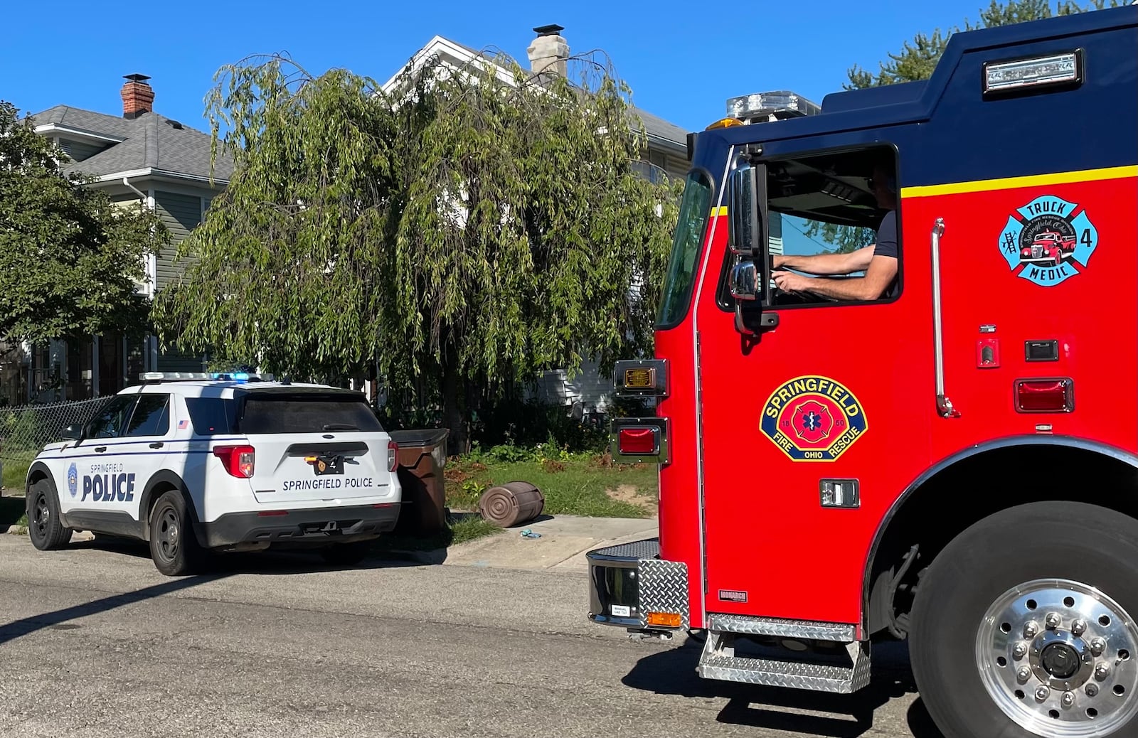 Springfield police and fire personnel were on the scene at a house in the 200 block of North Clairmont Avenue where a 2-year-old boy was found in a backyard pool Thursday, Aug. 31, 2023. BILL LACKEY/STAFF