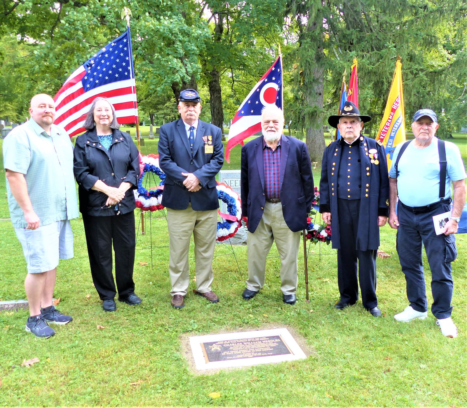 Henry Casey Camp No. 92 Sons of Union Veterans of the Civil War honored Charles William Needles with a bronze plaque recognizing him as the county’s last surviving Union veteran of the Civil War. Among about fifty people participating in the ceremony are left to right: Needles great great grandson John A. Needles; Kathryn L. (Needles) Mink great granddaughter; Donald E. Darby Commander of the Ohio Department Sons of Union Veterans of the Civil War; Springfield Mayor Warren R. Copeland; Major General Robert E. Grim, national commander of the Sons of Veterans Reserve and Needles great grandson Robert L. Needles. | PROVIDED