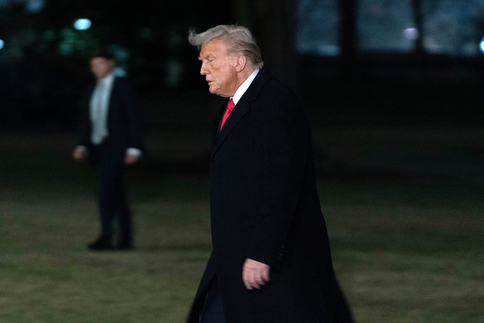 President Donald Trump arrives on the South Lawn of the White House, in Washington, Monday, Feb. 10, 2025. (AP Photo/Jose Luis Magana)