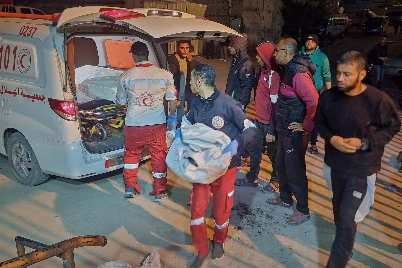 An ambulance carrying victims of an Israeli army strike arrives at the hospital in Khan Younis, southern Gaza Strip, Tuesday March 18, 2025.(AP Photo/ Mohammad Jahjouh)