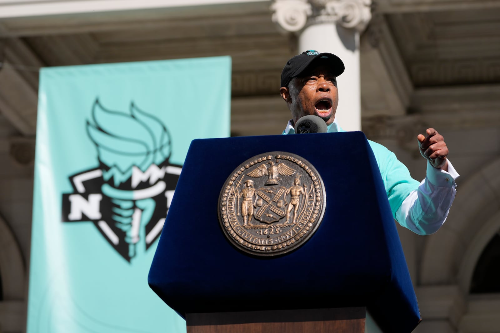 New York mayor Eric Adams speaks during a ceremony after a parade in honor of the Liberty's WNBA basketball championship at City Hall in New York, Thursday, Oct. 24, 2024. (AP Photo/Seth Wenig)