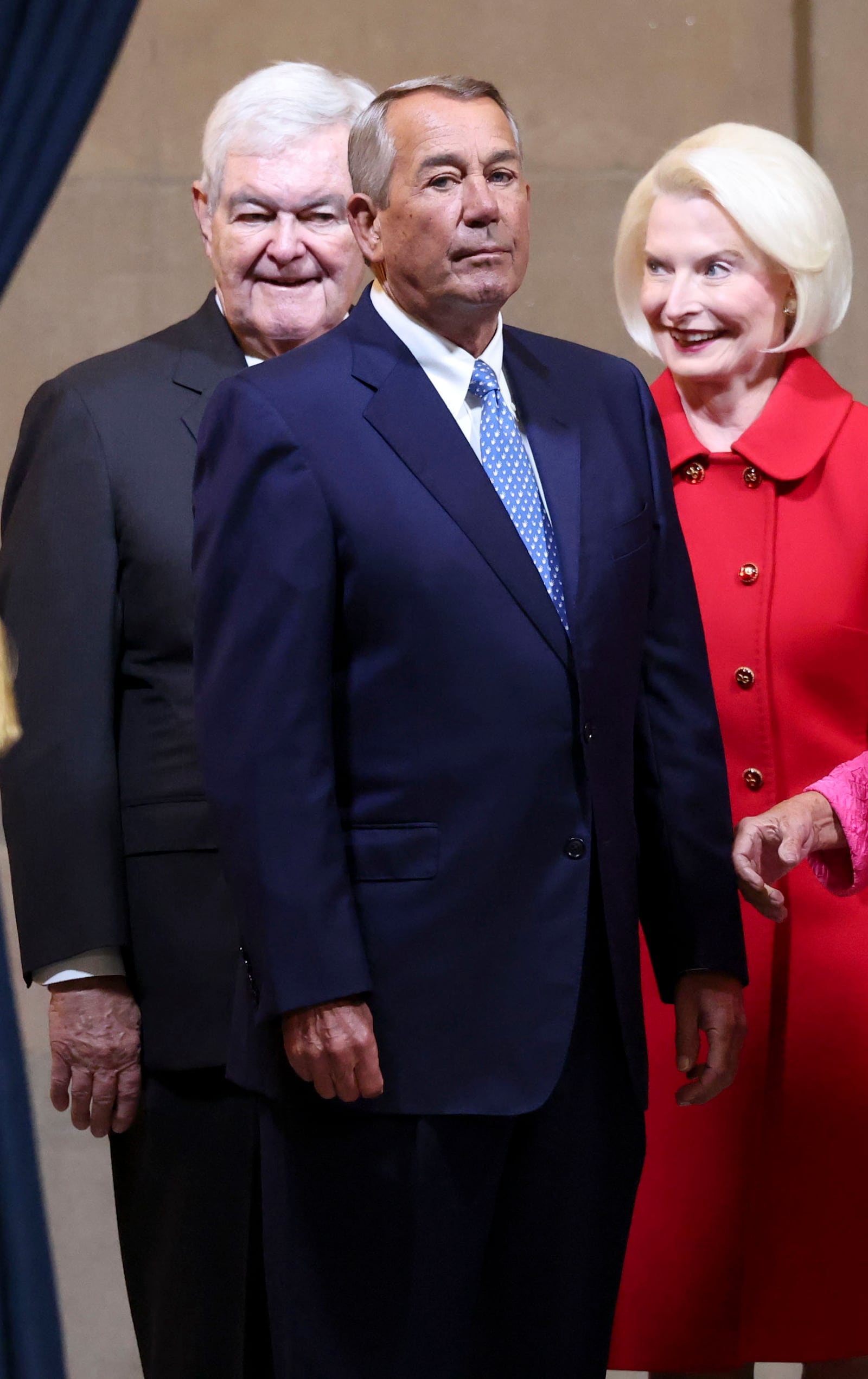 Newt Gingrich, left, his wife Callista Gingrich, right, and former Speaker of the House John Boehner arrive before the 60th Presidential Inauguration in the Rotunda of the U.S. Capitol in Washington, Monday, Jan. 20, 2025. (Kevin Lamarque/Pool Photo via AP)