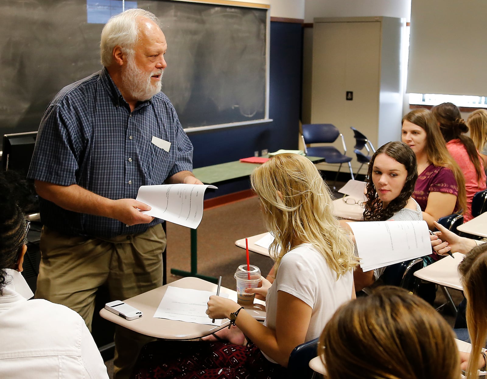 Three-term Springfield Mayor Warren Copeland teaches a class at Wittenberg University in this 2015 file photo. Bill Lackey/Staff