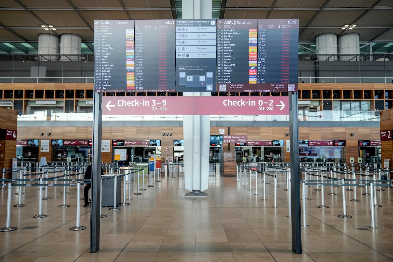 A terminal of the Berlin-Brandenburg airport is empty during the airports warning strike, Germany, Monday, March 10, 2025. (AP Photo/Ebrahim Noroozi)