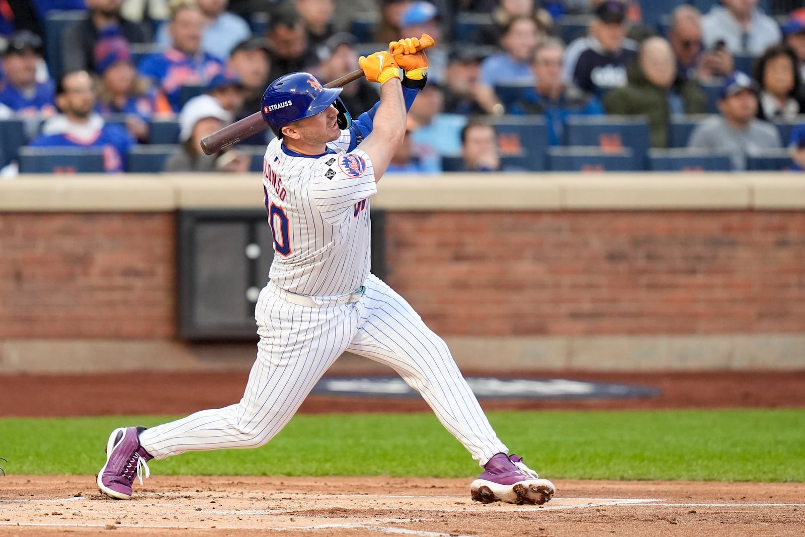 New York Mets' Pete Alonso hits a three-run home run against the Los Angeles Dodgers during the first inning in Game 5 of a baseball NL Championship Series, Friday, Oct. 18, 2024, in New York. (AP Photo/Frank Franklin II)