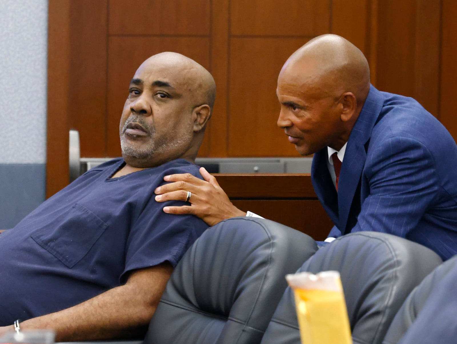 FILE - Duane "Keffe D" Davis, left, who is accused of orchestrating the 1996 slaying of hip-hop icon Tupac Shakur, listens to his attorney Carl Arnold during a hearing at the Regional Justice Center, on July 23, 2024, in Las Vegas. (Bizuayehu Tesfaye/Las Vegas Review-Journal via AP, File)