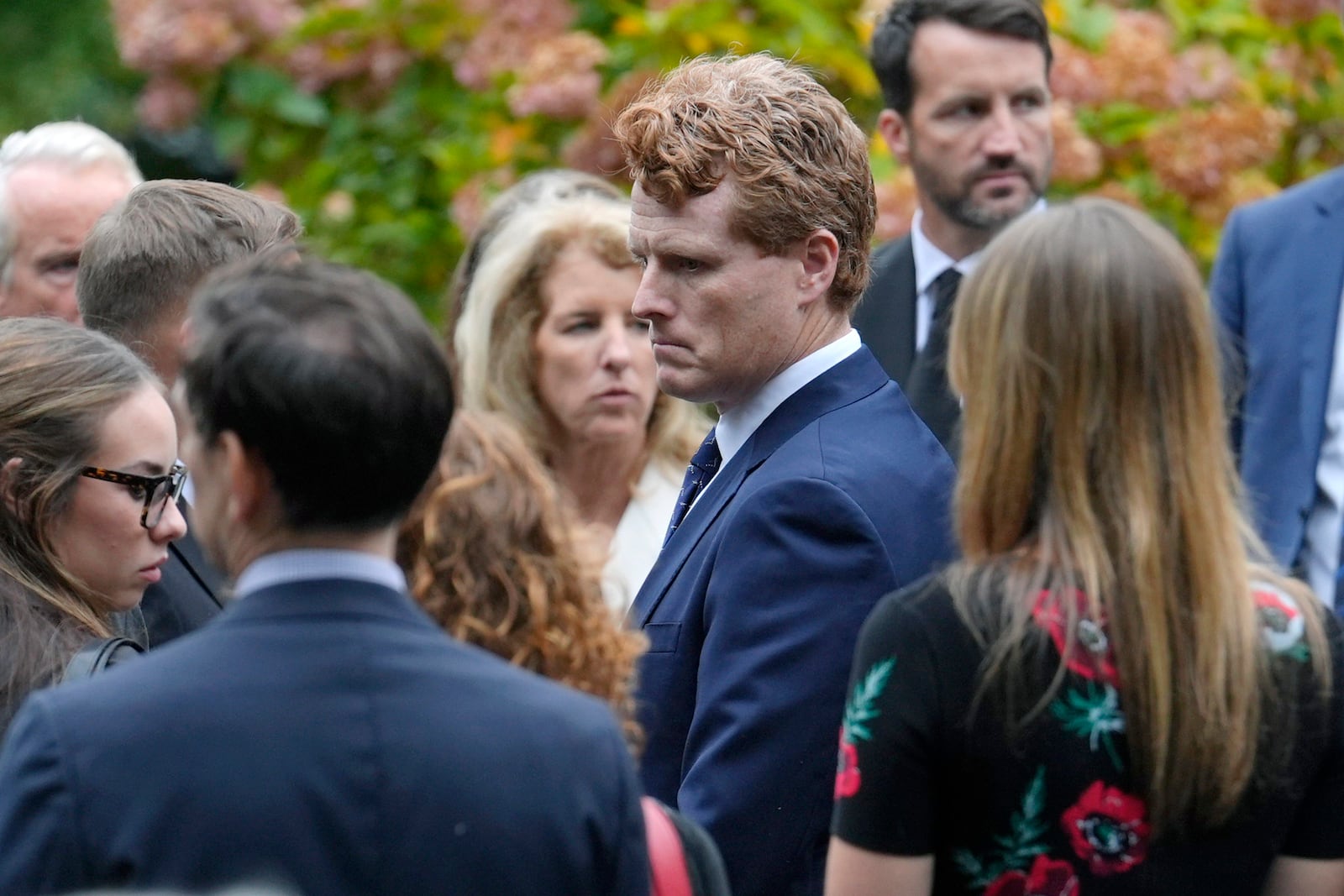 Joseph Kennedy III, center right, grandson of the late Ethel Kennedy arrives at Our Lady of Victory church, for Ethel Kennedy's funeral, Monday, Oct. 14, 2024, in Centerville, Mass. (AP Photo/Steven Senne)