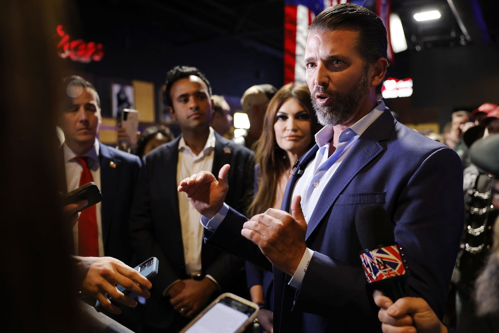 Donald Trump Jr. speaks to media during a rally for Bernie Moreno, Republican candidate for U.S. Senate, Wednesday, Feb. 28, 2024 at Lori's Roadhouse in West Chester Township. From left are Moreno, former GOP presidential candidate Vivek Ramaswamy, Kimberly Guilfoyle and Trump Jr. NICK GRAHAM/STAFF