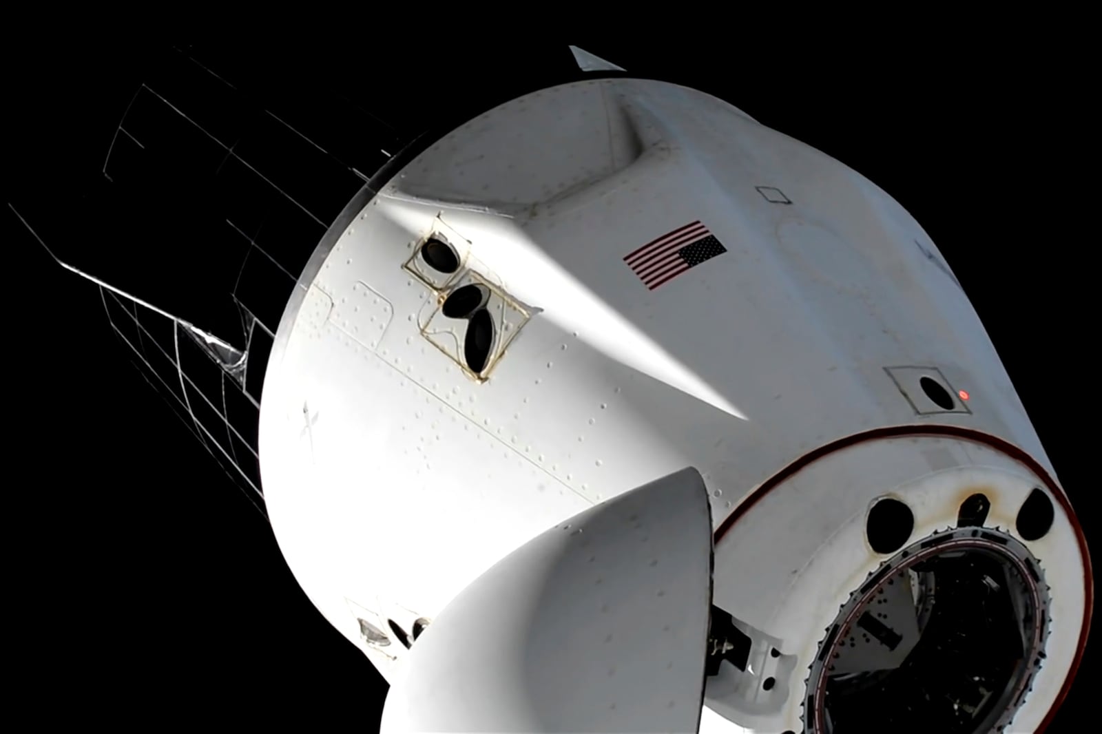 This image taken from NASA video shows the SpaceX capsule carrying NASA astronauts Suni Williams, Butch Wilmore and Nick Hague, and Russian astronaut Alexander Gorbunov, undocking from the International Space Station on Tuesday, March 18, 2025. (NASA via AP)