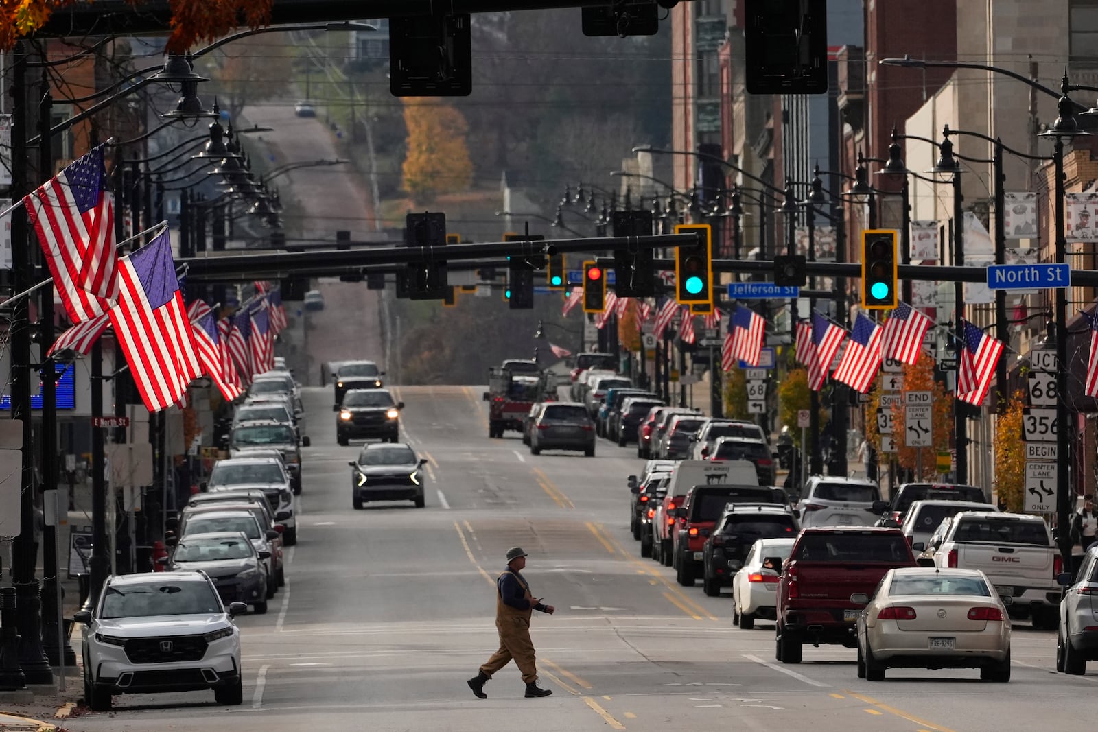 American flags line Main Street on Election Day, Tuesday, Nov. 5, 2024, in Butler, Pa. (AP Photo/Robert F. Bukaty)