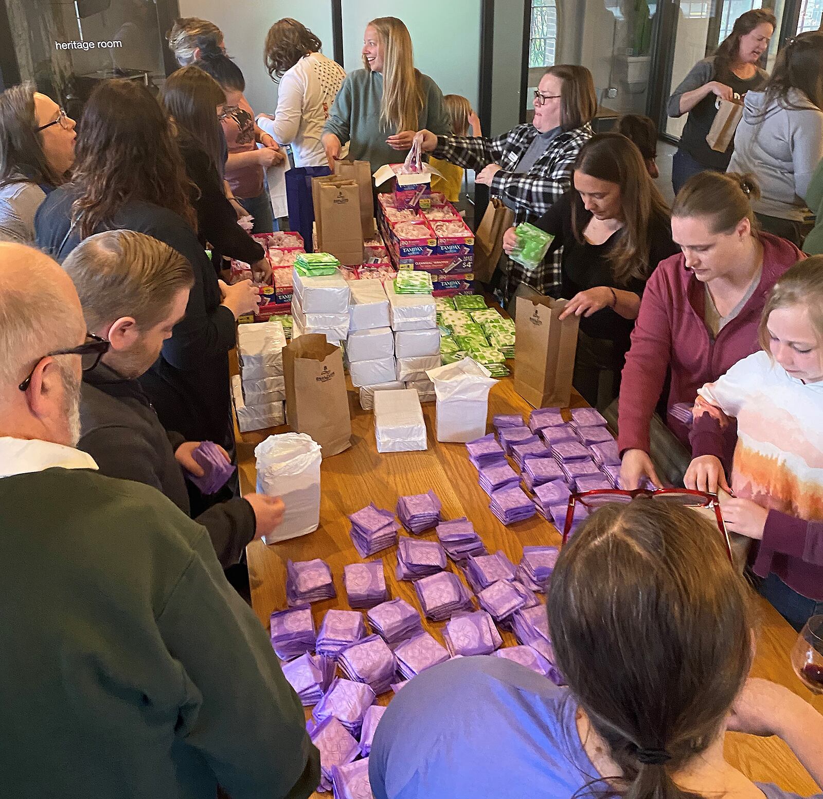 About 30 people gathered at COhatch The Marketplace in downtown Springfield on Tuesday, May 2, 2023, to prepare Period Kits, feminine hygiene products that will be donated to Clark County organizations to aid schools, health care groups and others as they provide help to girls and women in need. BEN McLAUGHLIN/STAFF