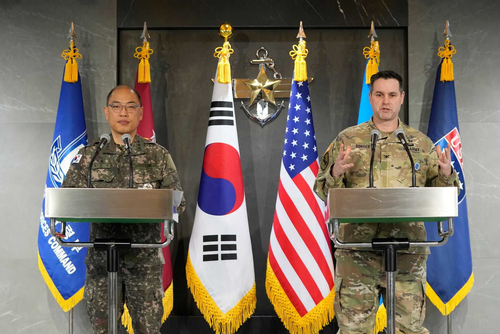 Lee Sung Joon, left, public affairs director of South Korea's Joint Chiefs of Staff (JCS), and his U.S. Forces Korea counterpart Ryan Donald attend a press briefing of the Freedom Shield exercise at the JCS headquarters in Seoul, South Korea, Thursday, March 6, 2025. (AP Photo/Ahn Young-joon)