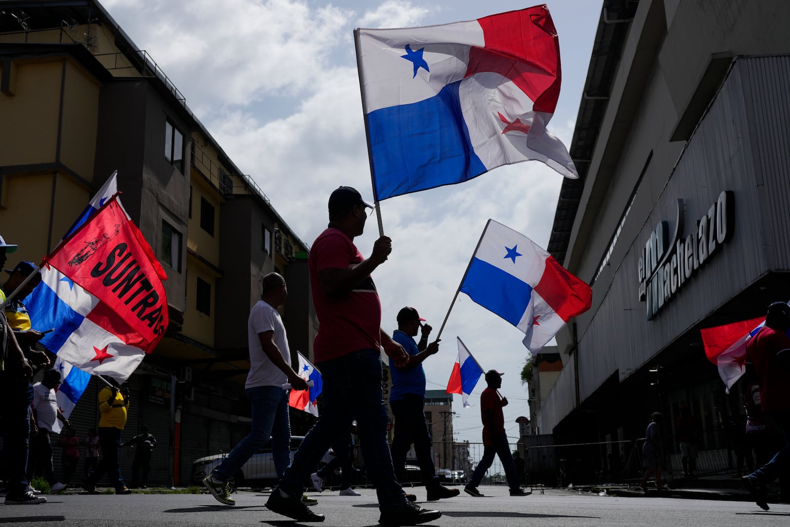 Protesters march against U.S. Secretary of State Marco Rubio's visit in Panama City, Panama, Sunday, Feb. 2, 2025. (AP Photo/Matias Delacroix)