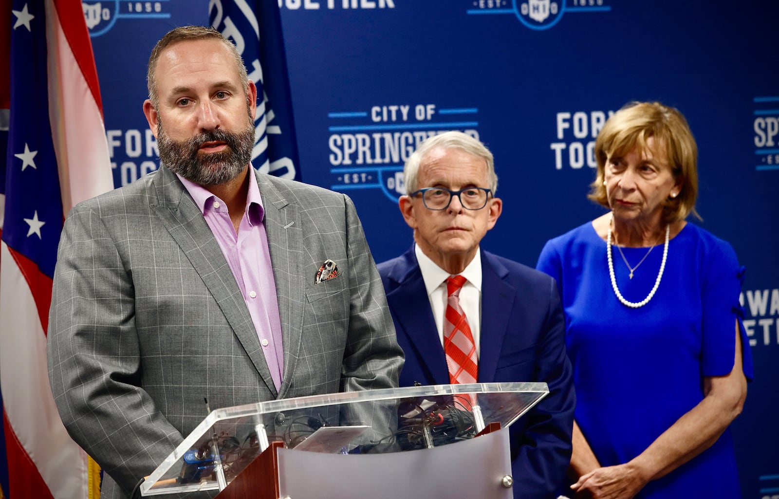 Springfield schools  Superintendent Bob Hill, with Ohio Governor Mike DeWine, and his wife Fran, answer questions at a press conference Tuesday, September 17, 2024 at City Hall in Springfield.  MARSHALL GORBY \STAFF