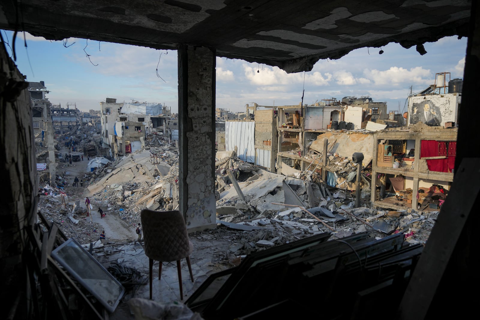 The destruction caused by the Israeli air and ground offensive is seen from a destroyed building in Jabaliya, Gaza Strip, Wednesday, Feb. 5, 2025. (AP Photo/Abdel Kareem Hana)