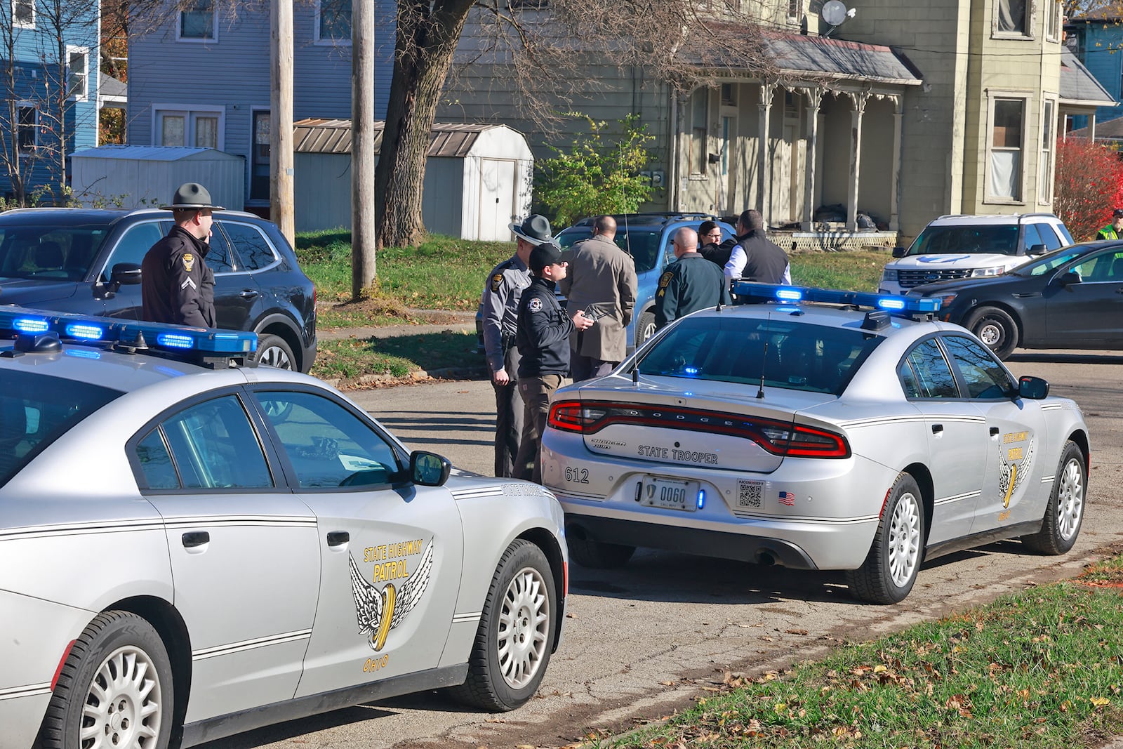 Springfield Police and the State Highway Patrol investigate crash in an alley between Southern Avenue and Johnny Lytle that possibly is connected to a shooting in the 100 block of West Southern Avenue Tuesday, Nov. 26, 2024. BILL LACKEY/STAFF