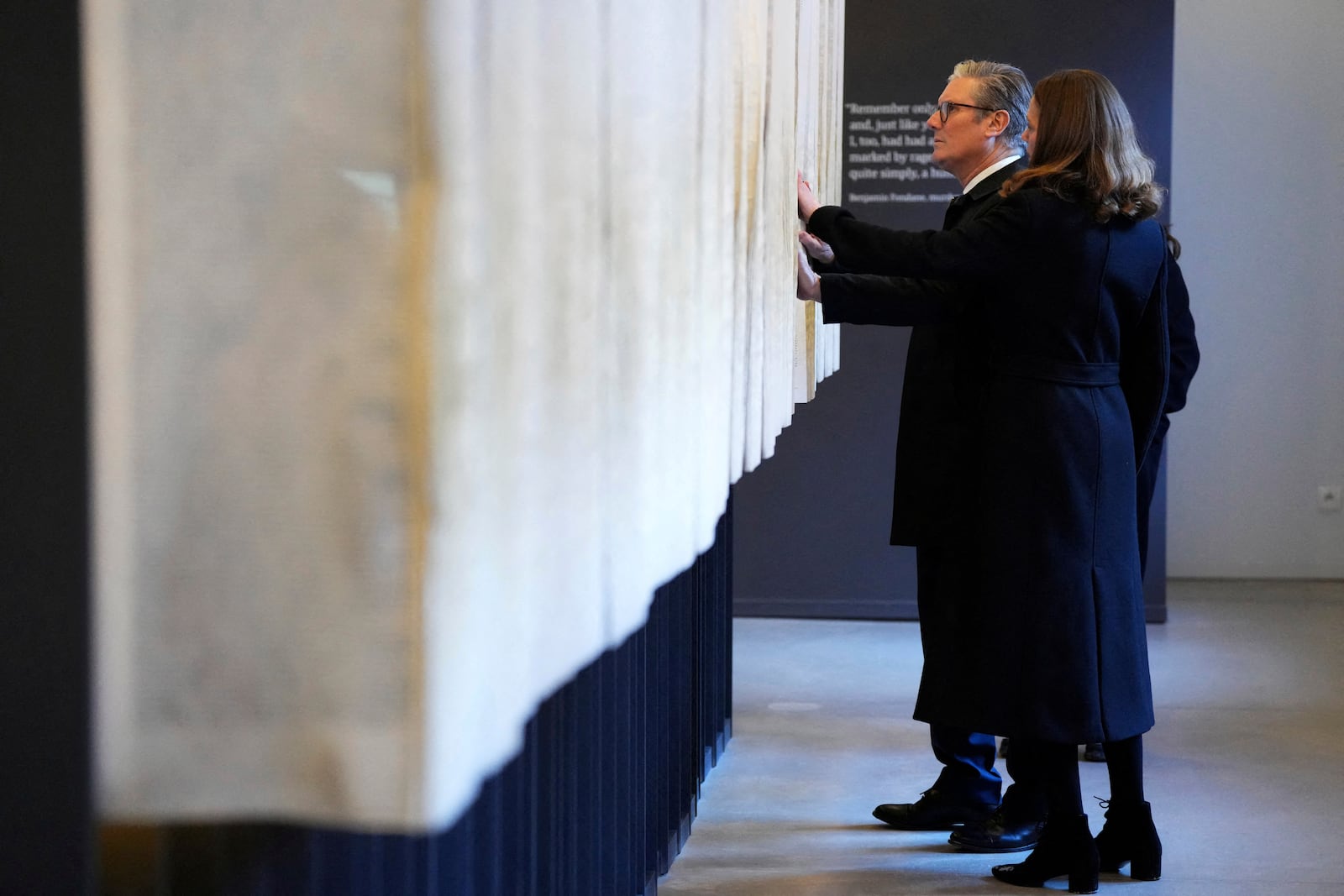 Britain's Prime Minister Keir Starmer and his wife Victoria Starmer visit the Memorial And Museum Auschwitz-Birkenau, a former Nazi German concentration and extermination camp, in Oswiecim, Poland, Friday Jan. 17, 2025. (Aleksandra Szmigiel/Pool via AP)