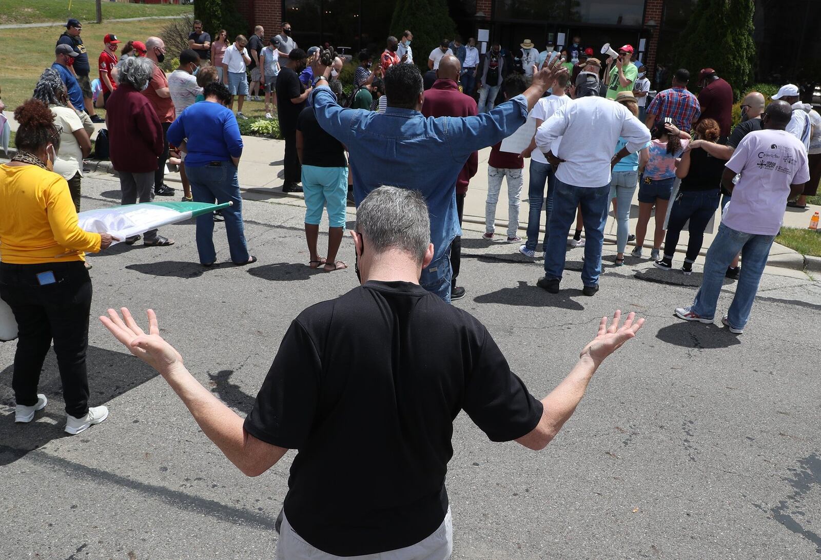 Participants in the Prayer March on Sunday stopped and gathered at several churches along the six-mile route. BILL LACKEY/STAFF