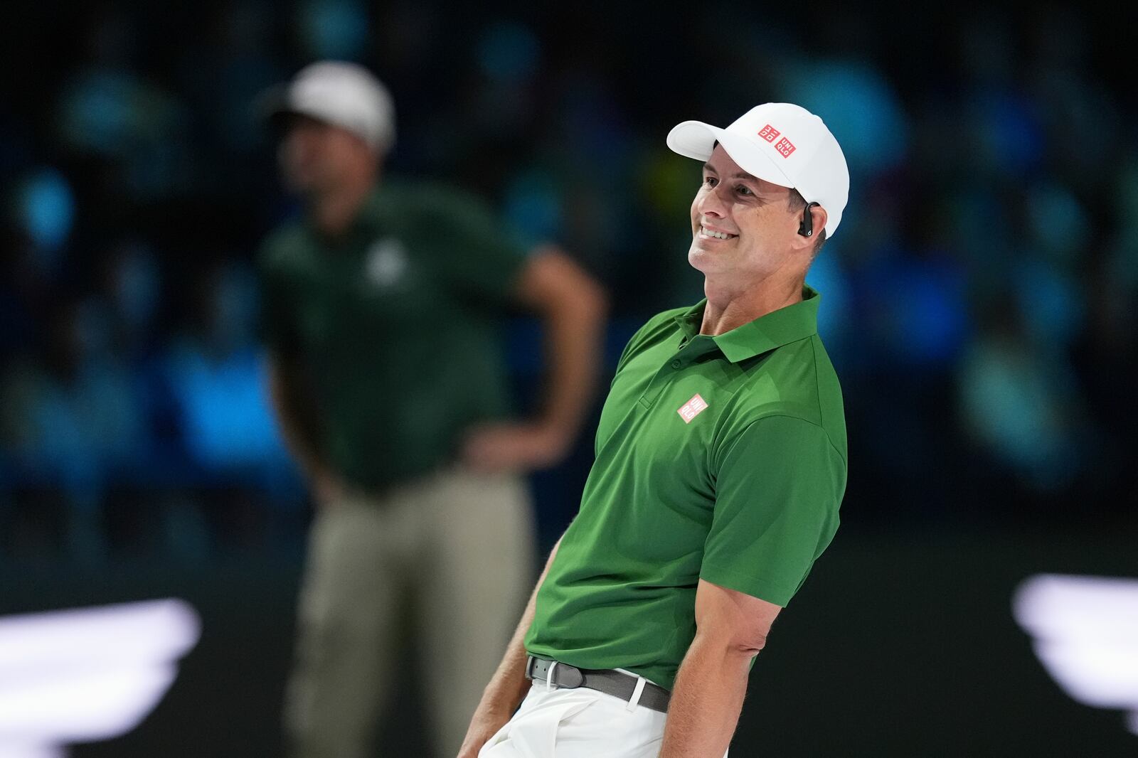 Adam Scott of Boston Common Golf leans as he follows his shot on the seventh hole during a match of the TMRW Golf League (TGL) against Jupiter Links Golf Club, Monday, Jan. 27, 2025, in Palm Beach Gardens, Fla. (AP Photo/Rebecca Blackwell)