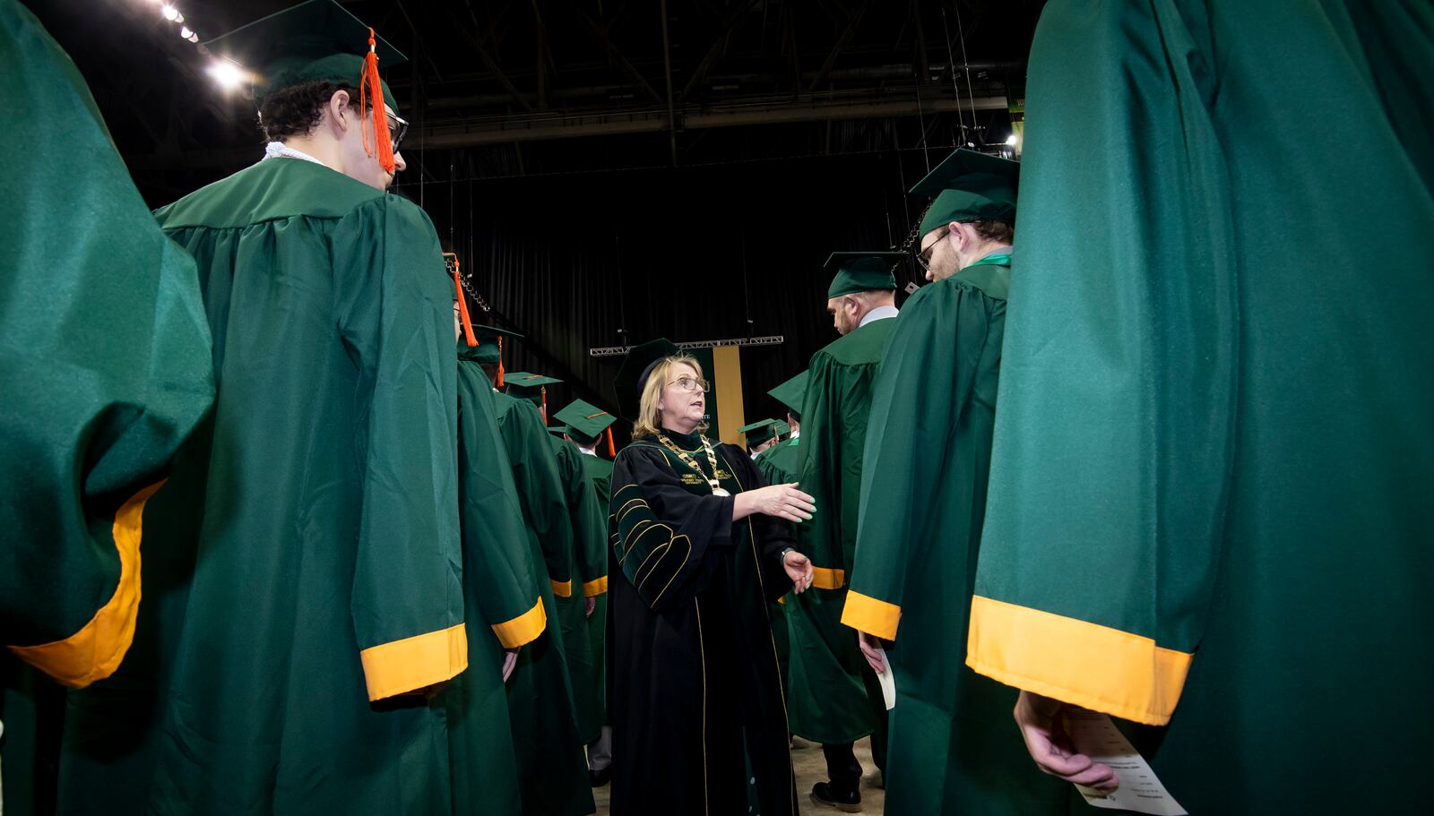 Wright State University President Sue Edwards greets new graduates at the spring commencement ceremony at the Nutter Center, Saturday, April 27, 2024. ERIN PENCE PHOTO / Wright State U.