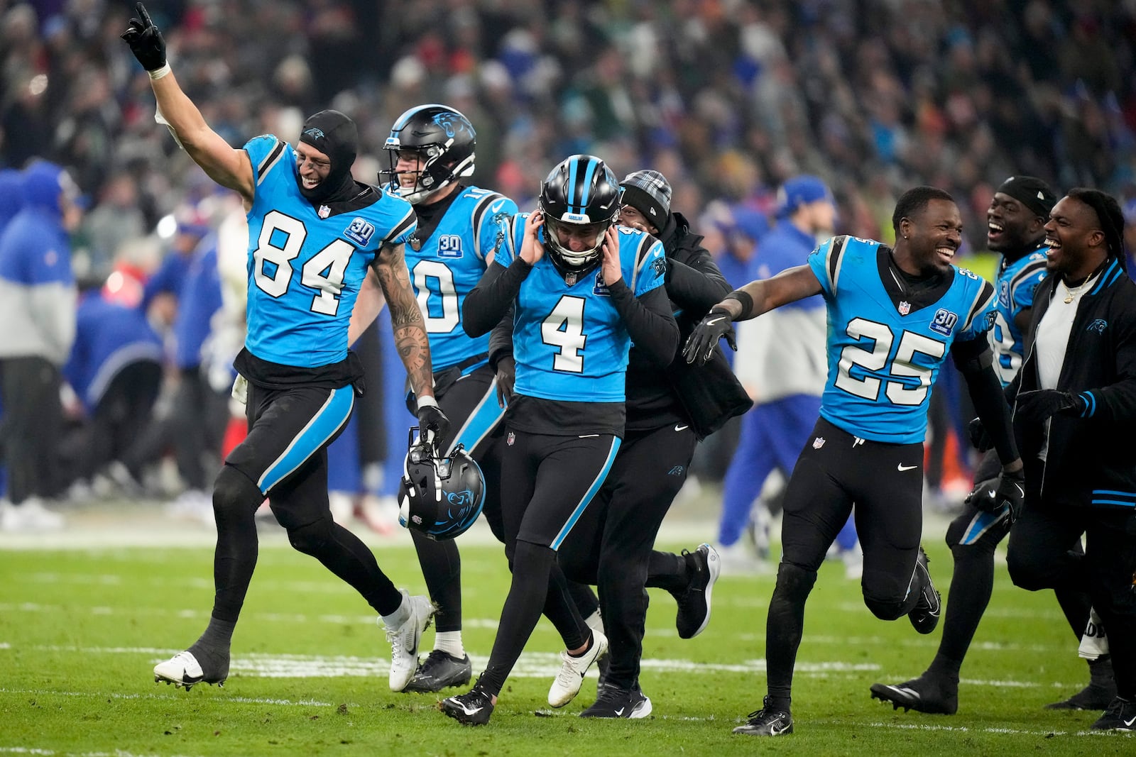 Carolina Panthers kicker Eddy Pineiro celebrates after kicking the game-winning field goal in overtime against New York Giants during an NFL football game, Sunday, Nov. 10, 2024, in Munich, Germany. (AP Photo/Matthias Schrader)