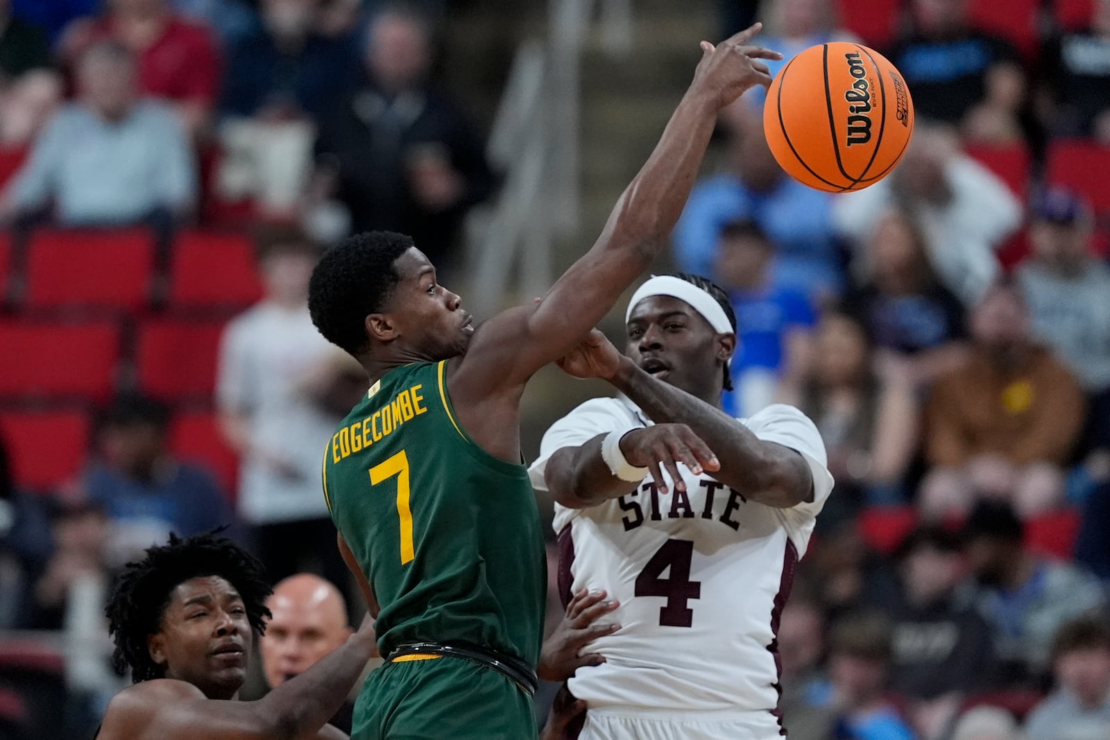 Baylor guard VJ Edgecombe blocks a pass by Mississippi State forward Cameron Matthews during the first half in the first round of the NCAA college basketball tournament, Friday, March 21, 2025, in Raleigh, N.C. (AP Photo/Chris Carlson)