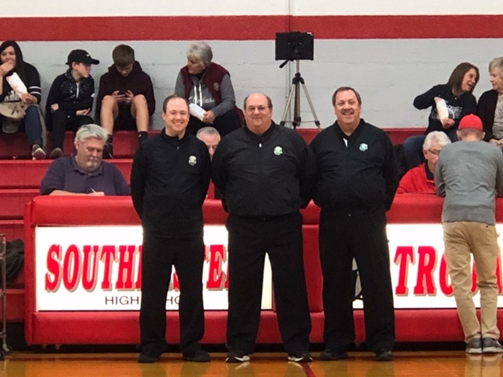 Rick Delaney recently officiated his final high school basketball game after 40 years on Monday, Dec. 30, 2019. Delaney (middle) is pictured with fellow officials Dave Saunders (right) and Chris Saunders (left). CONTRIBUTED