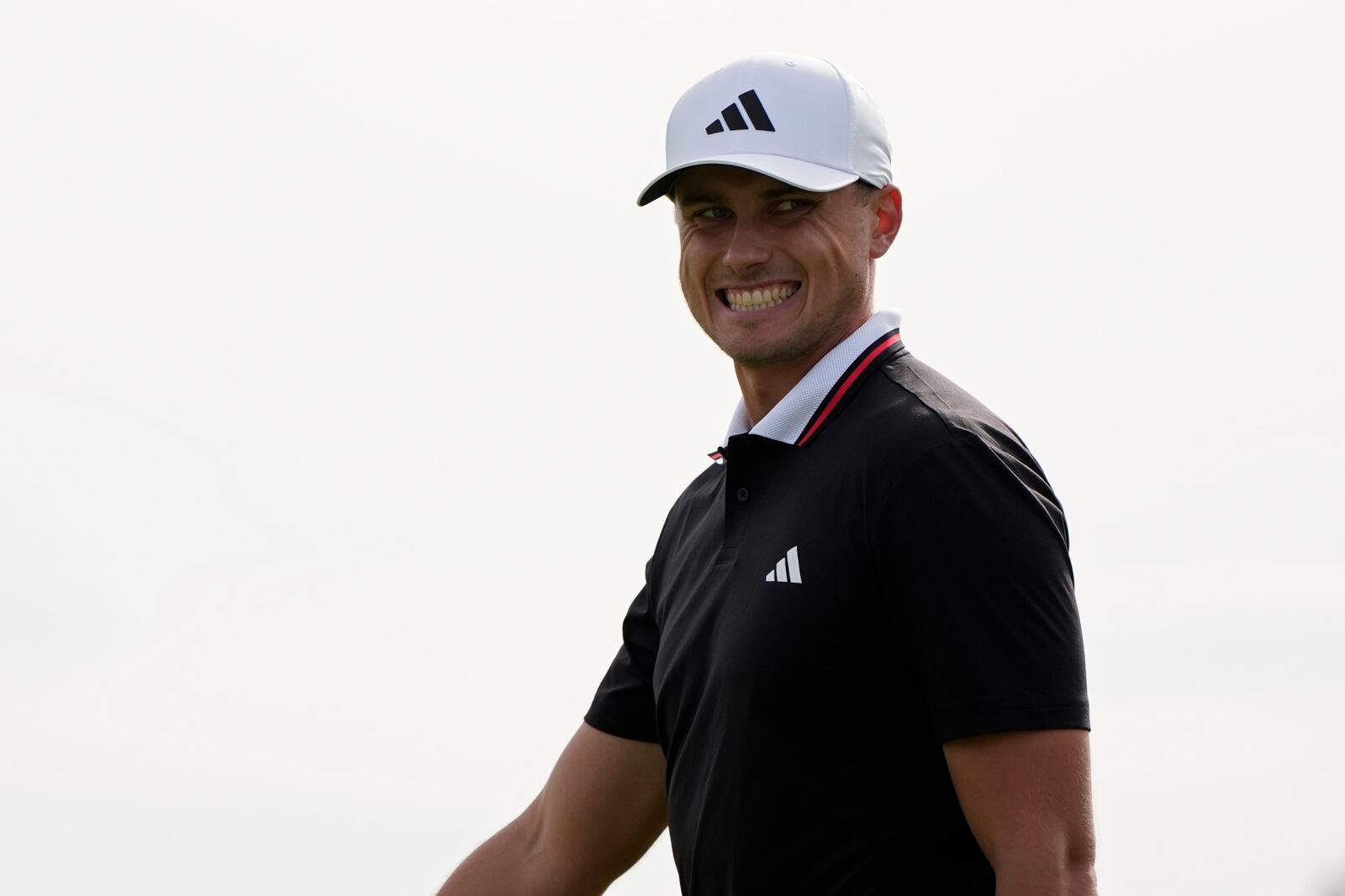 Ludvig Åberg, of Sweden, reacts after missing a putt on the 17th green of the South Course at Torrey Pines during the final round of the Genesis Invitational golf tournament Sunday, Feb. 16, 2025, in San Diego. (AP Photo/Gregory Bull)