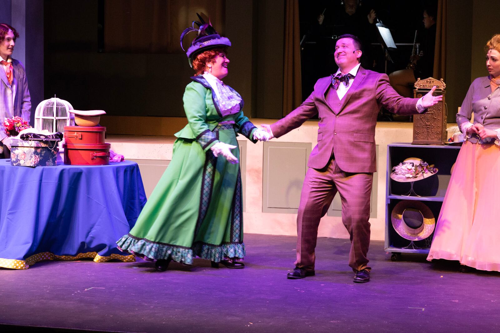 left to right: Kevin Willardson (Barnaby Tucker), Tina McPhearson (Dolly Levi), Chris Nelson (Cornelius Hackl) and Logan Richardson (Irene Malloy) in Dayton Playhouse's production of "Hello, Dolly!" PHOTO BY RICK FLYNN PHOTOGRAPHY