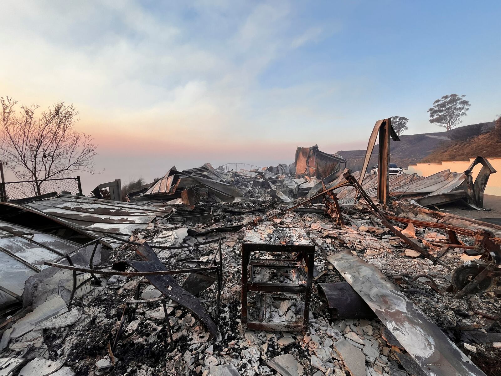 This photo taken by race car driver Townsend Bell shows his burned home in Malibu, Calif., in a photo taken Jan. 8, 2025 . (Townsend Bell via AP)