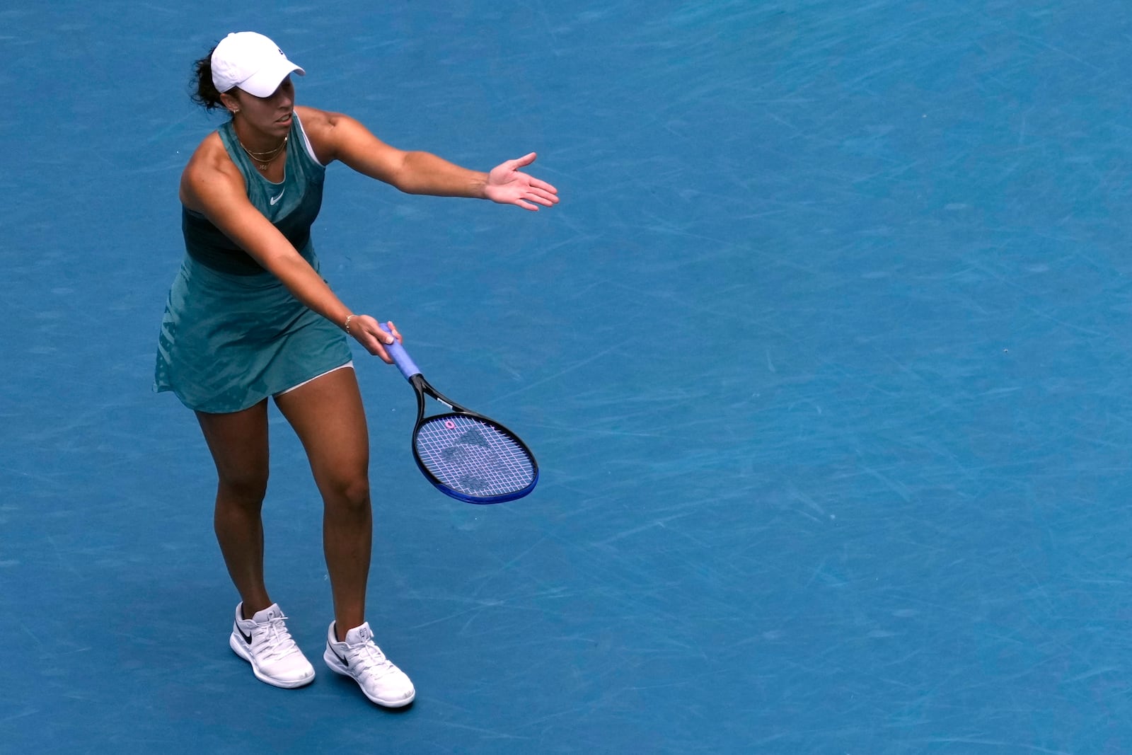 Madison Keys of the U.S. reacts during her quarterfinal match against Elina Svitolina of Ukraine at the Australian Open tennis championship in Melbourne, Australia, Wednesday, Jan. 22, 2025. (AP Photo/Asanka Brendon Ratnayake)