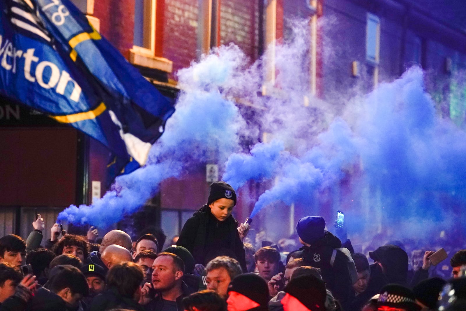 Everton fans ahead the English Premier League soccer match between Everton and Liverpool, Liverpool, England, Wednesday, Feb.12, 2025. (AP Photo/Dave Thompson)