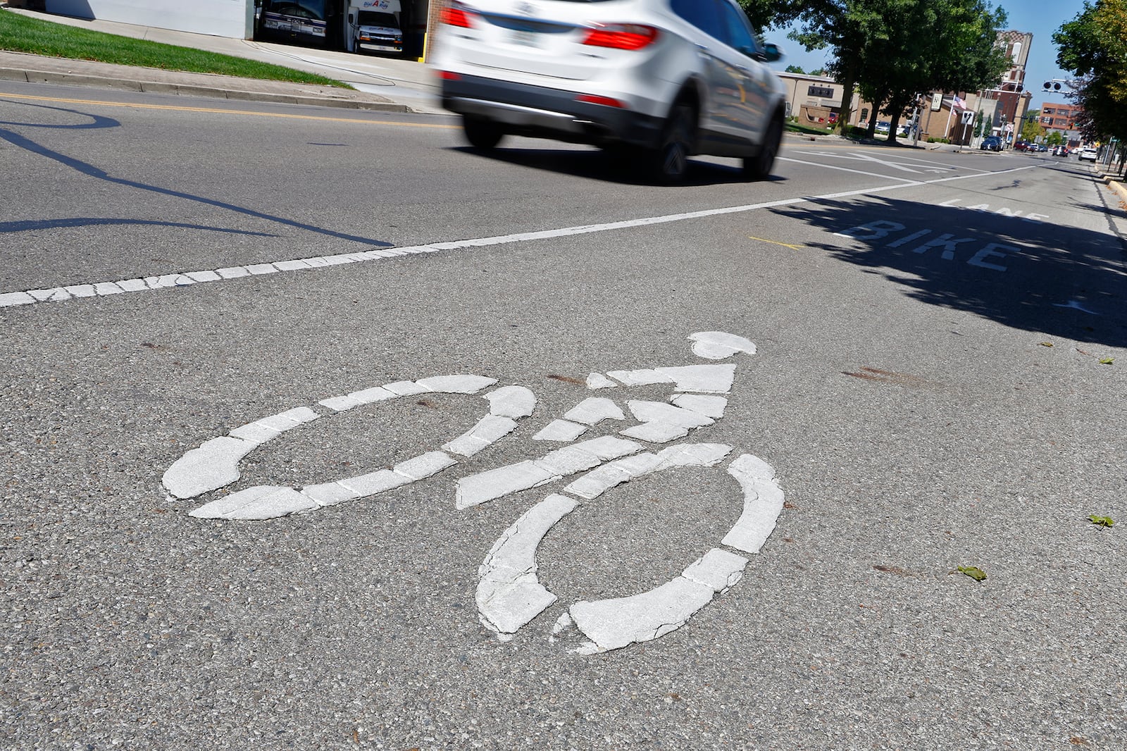 A bicycle lane along Center Street in Springfield Tuesday, August 29, 2023. BILL LACKEY/STAFF