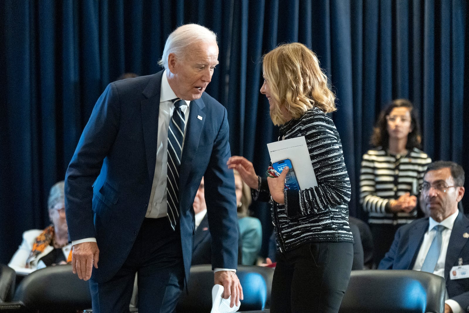 FILE - U.S. President Joe Biden talks to Italy's Prime Minister Giorgia Meloni at the meeting of the Global Coalition to Address Synthetic Drug Threats in New York, Sept. 24, 2024. (AP Photo/Manuel Balce Ceneta, File)