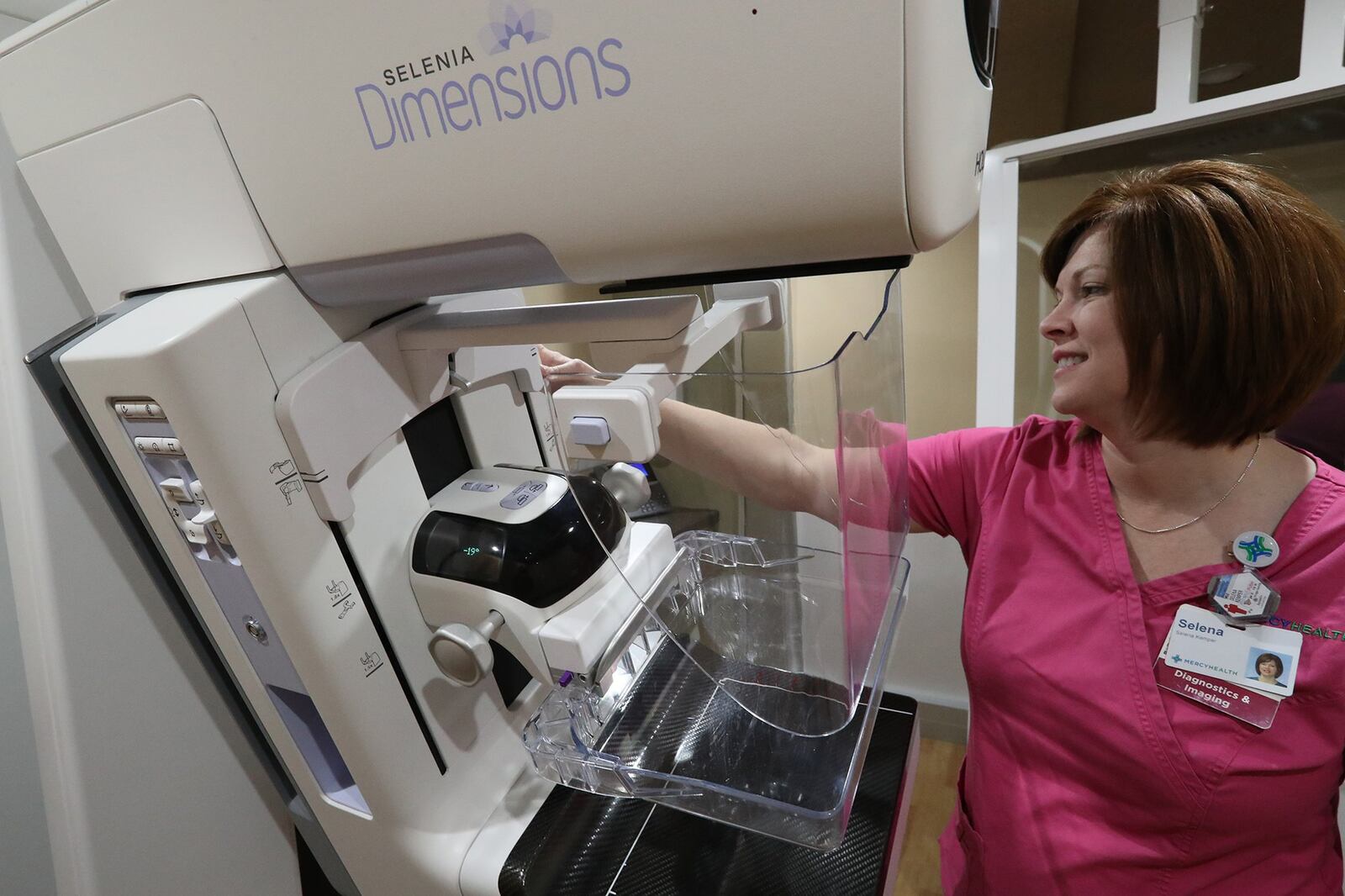 The 3D mammography machine is ready for a patient inside Mercy Health mobile mammography unit earlier this year outside the Upper Valley Mall. BILL LACKEY/STAFF