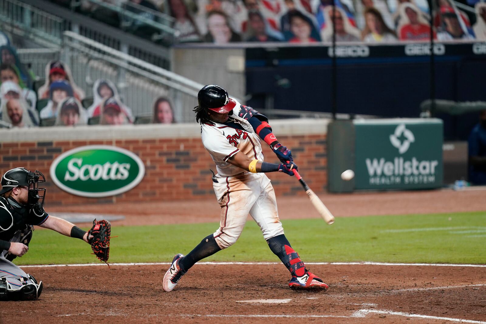 Atlanta Braves' Ronald Acuna Jr. hits an RBI double during the sixth inning of the team's baseball game against the Miami Marlins on Wednesday, Sept. 9, 2020, in Atlanta. (AP Photo/Brynn Anderson)