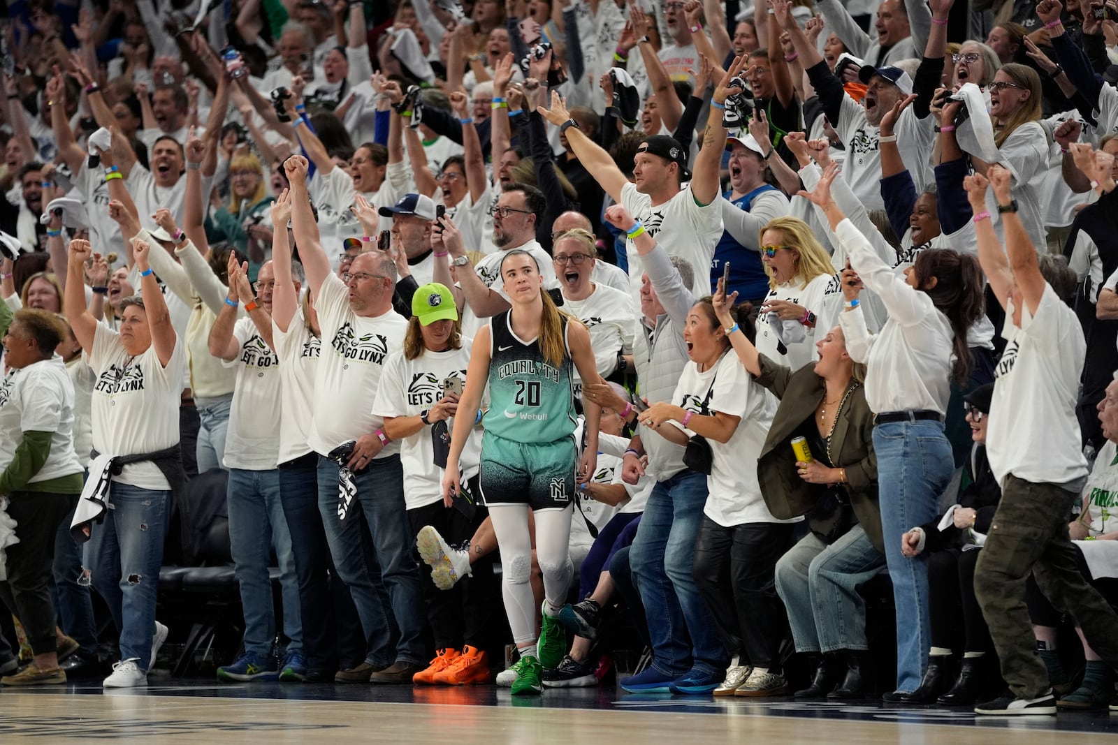 New York Liberty guard Sabrina Ionescu (20) reacts after missing a shot at the buzzer during the second half of Game 4 of a WNBA basketball final playoff series, Friday, Oct. 18, 2024, in Minneapolis. The Lynx won 82-80, forcing a Game 5 in the series. (AP Photo/Abbie Parr)