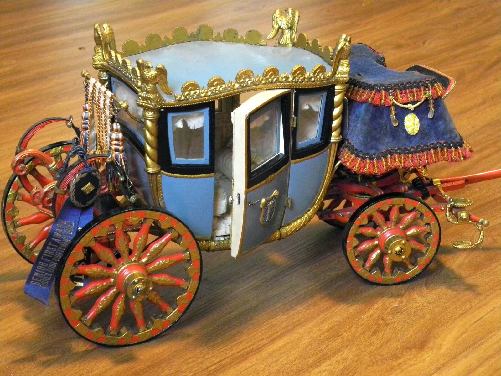 This original, unrestored Fisher Body Napoleonic Coach model that was entered in the first FBCG contest in 1931.  
This  scratch-built model was built and entered by Russell Nielsen of Minnesota, and will be represented at the Dayton Concours by Russell's nephew, Jeffrey Nielsen, who is also a Guild Alumni.  This rare and unique coach model, now 90 years old, is a beautiful example of the hand craftsmanship typical for the early days of the contest. Photo by Jeffrey Neilsen