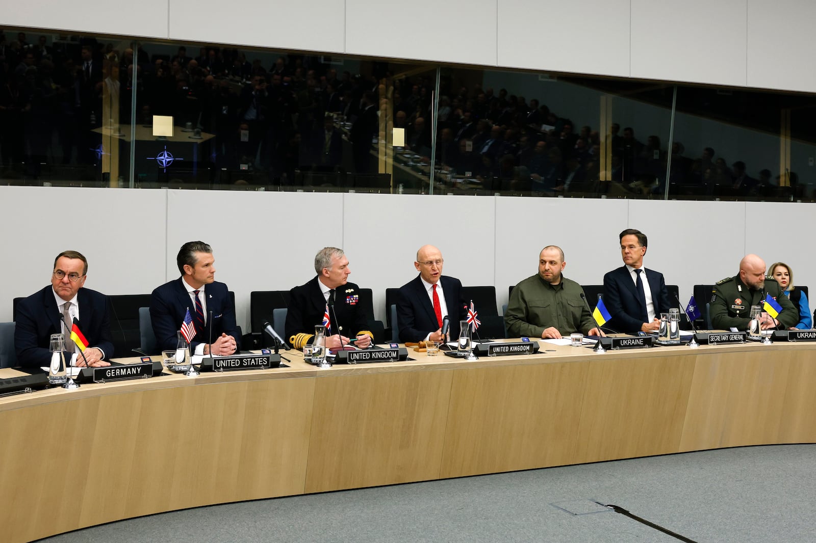 Germany's Defense Minister Boris Pistorius, left, United States Secretary of Defense Pete Hegseth, second left, Britain's Defense Secretary John Healey, center, Ukraine's Defense Minister Rustem Umerov, fourth right, and NATO Secretary General Mark Rutte, third right, attend a meeting of the Ukraine Defense Contact group at NATO headquarters in Brussels, Wednesday, Feb. 12, 2025. (AP Photo/Omar Havana)