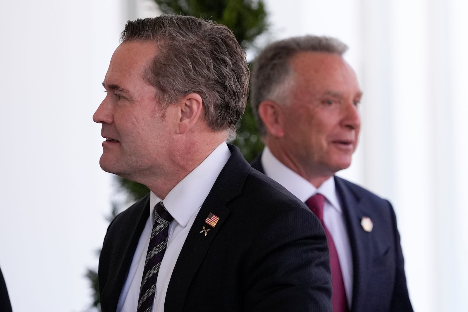 U.S. National Security Advisor Michael Walz, left, and Special Envoy to the Middle East Steve Witkoff, walk back after speaki15 to the media outside the West Wing of the White House, Tuesday, Feb. 4, 2025, in Washington. (AP Photo/Alex Brandon)